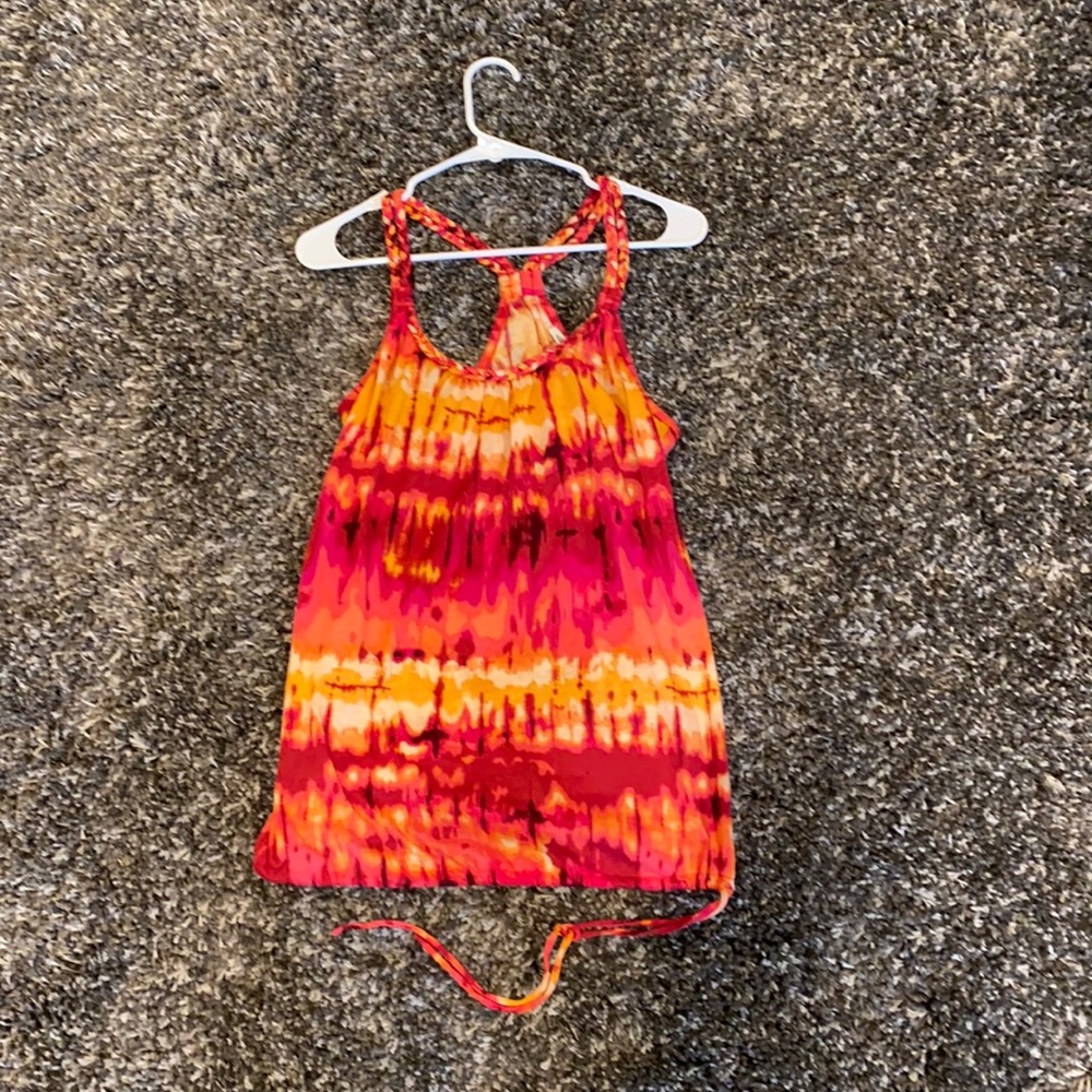 Tank top. Back showing. A little thick.